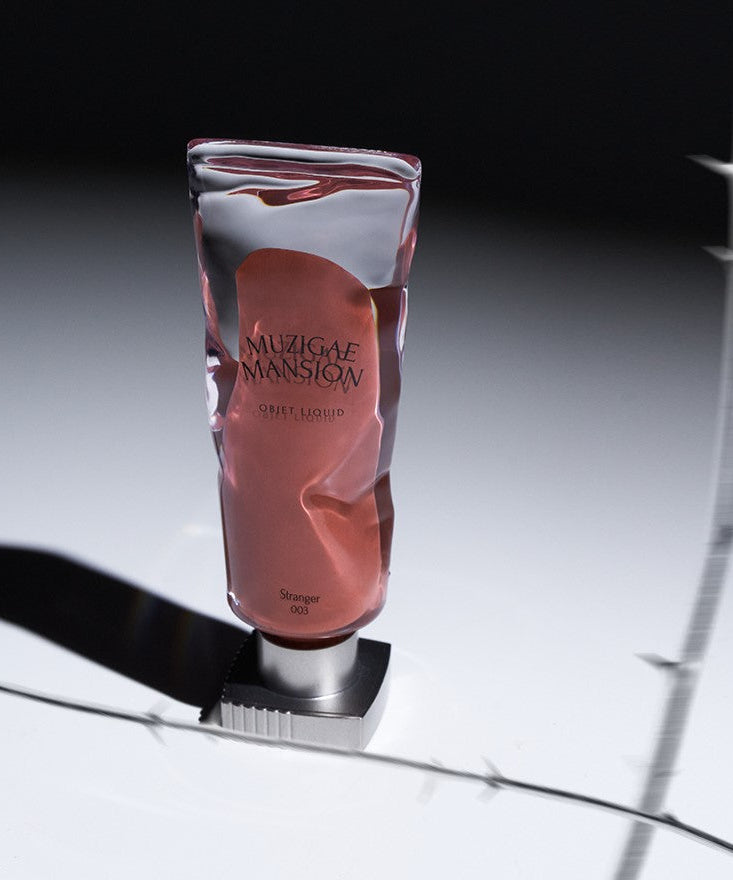 MUZIGAE MANSION Objet Liquid Tint in unique packaging on display