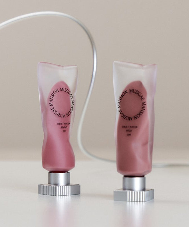 MUZIGAE MANSION Objet Water Tint bottles on display.