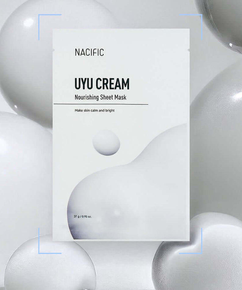 NACIFIC Milk Cream Nourishing Mask Pack packaging displayed amidst white cream-like spheres, emphasizing skincare benefits.