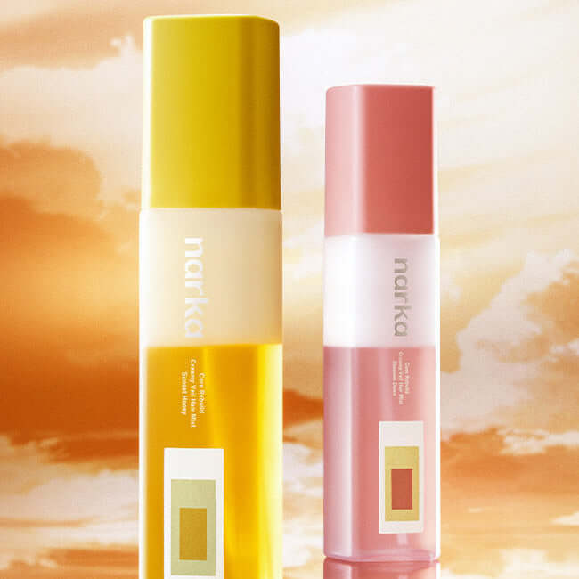 NARKA Creamy Veil Hair Mist bottles against a warm, sunny background for hair nourishment and shine.