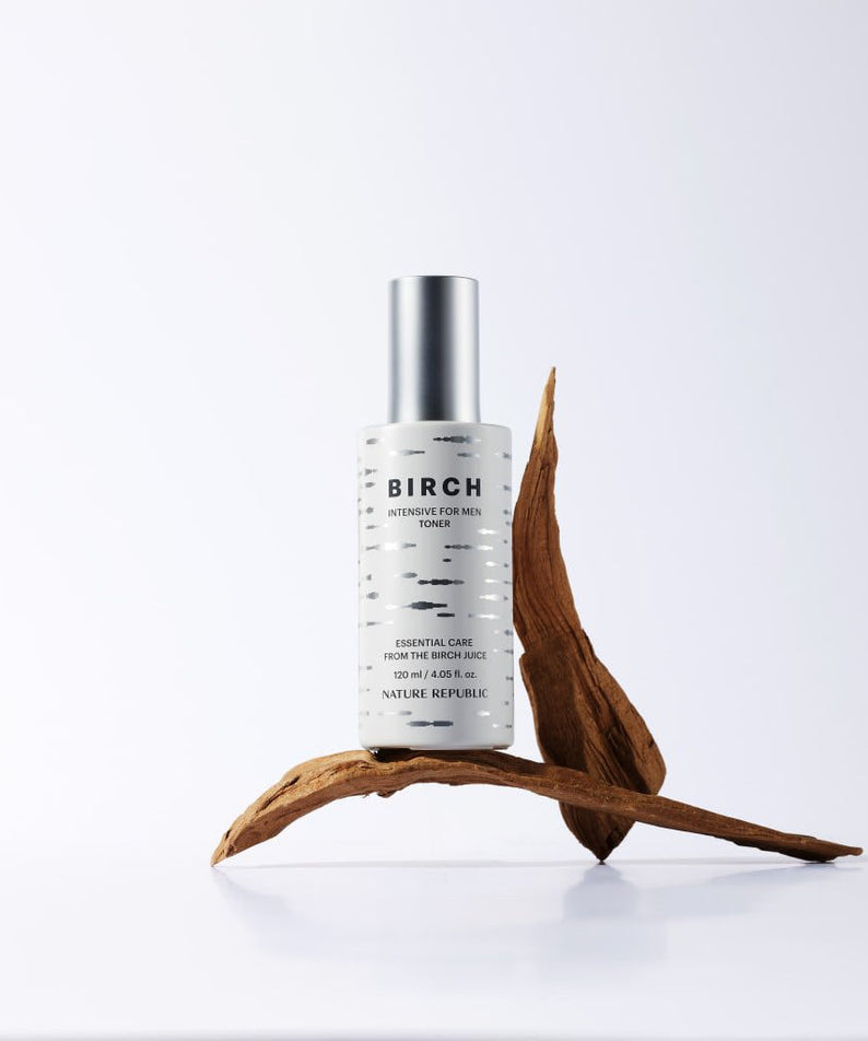 NATURE REPUBLIC Birch Intensive For Men Toner 120ml on minimal white background with wood prop – Gentleman Korea product photo