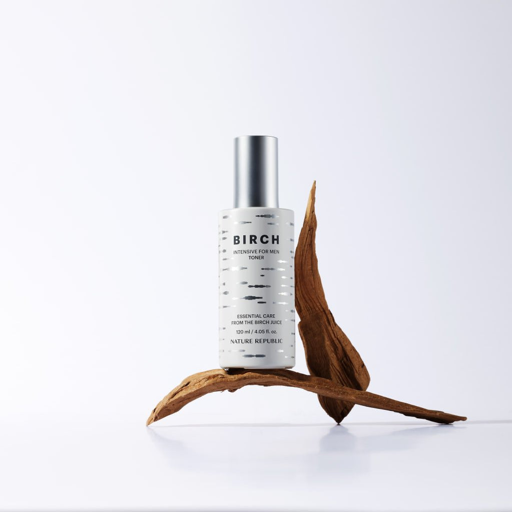 NATURE REPUBLIC Birch Intensive For Men Toner 120ml on minimal white background with wood prop – Gentleman Korea product photo