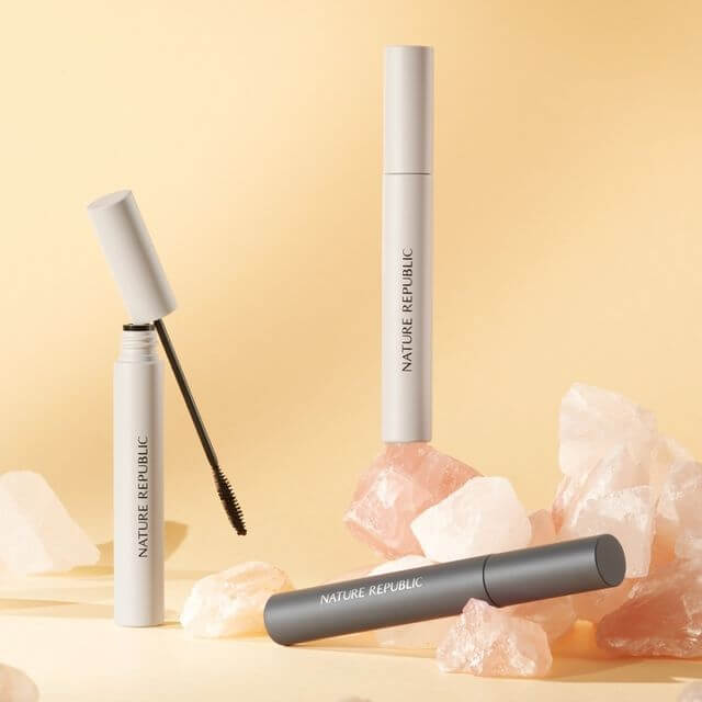 NATURE REPUBLIC Botanical Superproof Mascara on display with open brush and crystals in background