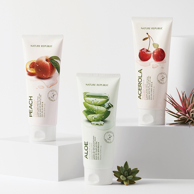 NATURE REPUBLIC Fresh Herb Foam Cleansing 170ml with fruits and aloe for radiant skin in a modern white packaging with succulent decor.