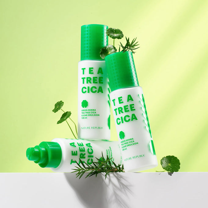 NATURE REPUBLIC Green Derma Tea Tree Cica Clear Emulsion 130ml bottles with green herbal elements and vibrant background.