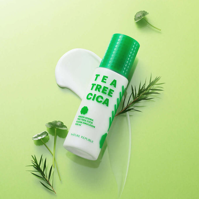 NATURE REPUBLIC Green Derma Tea Tree Cica Clear Emulsion 130ml bottle with tea tree leaves on a green background.