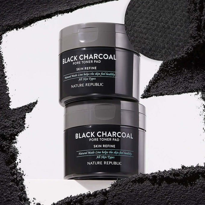 NATURE REPUBLIC Made Black Charcoal pore Toner Pads 100g - two jars with charcoal texture background