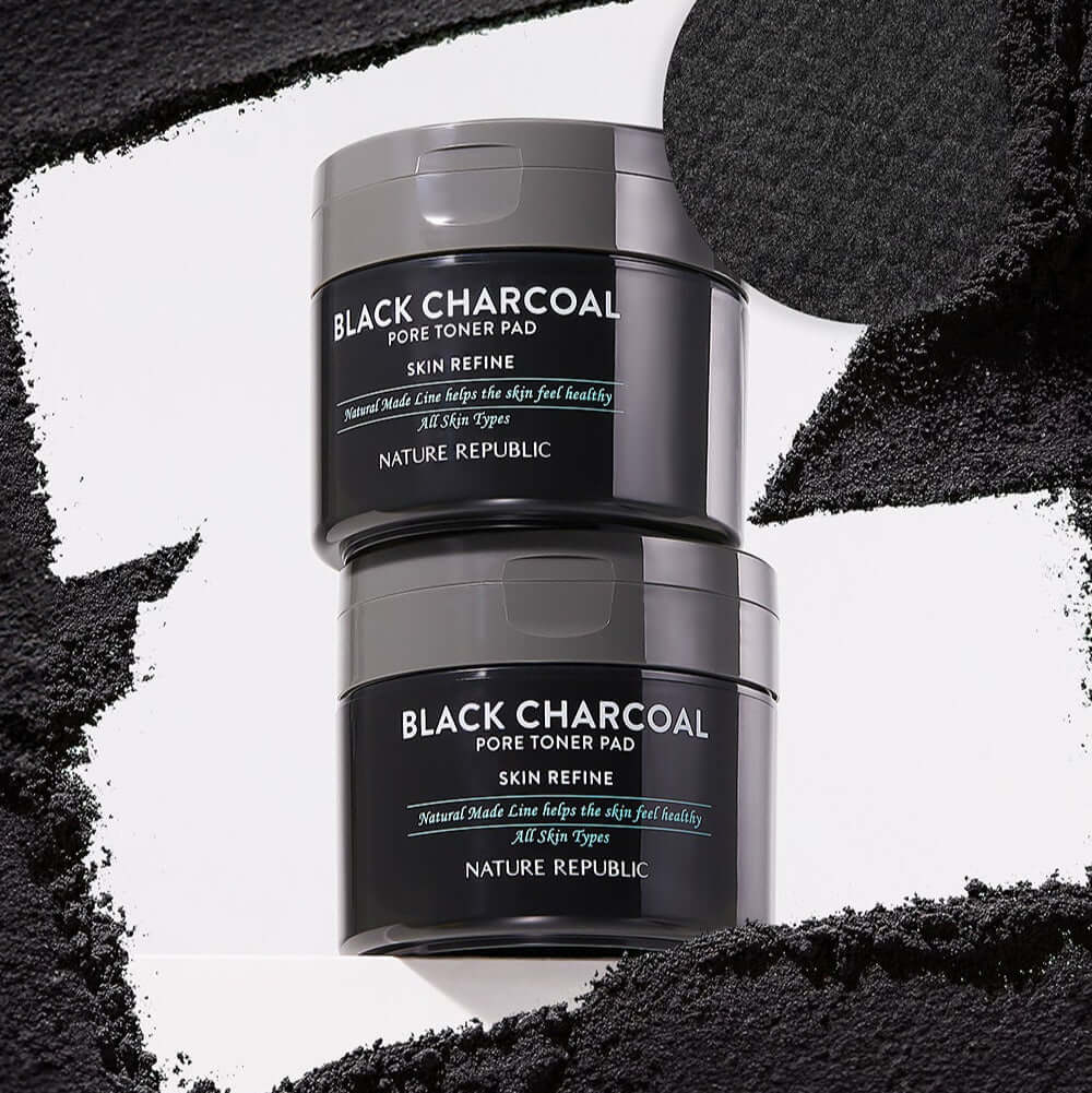NATURE REPUBLIC Made Black Charcoal pore Toner Pads 100g - two jars with charcoal texture background