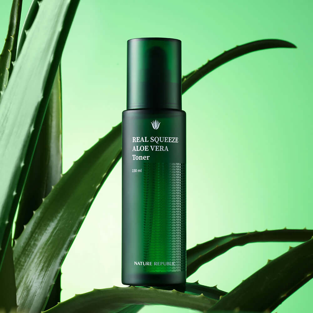 NATURE REPUBLIC Real Squeee ALoe Vera Toner 150ml product bottle with aloe plants in the background.