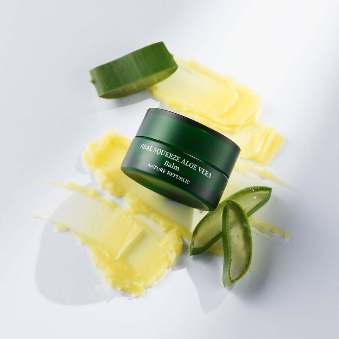 NATURE REPUBLIC Real Squeeze ALoe Vera Balm 25g with aloe leaves and balm spread on white surface.