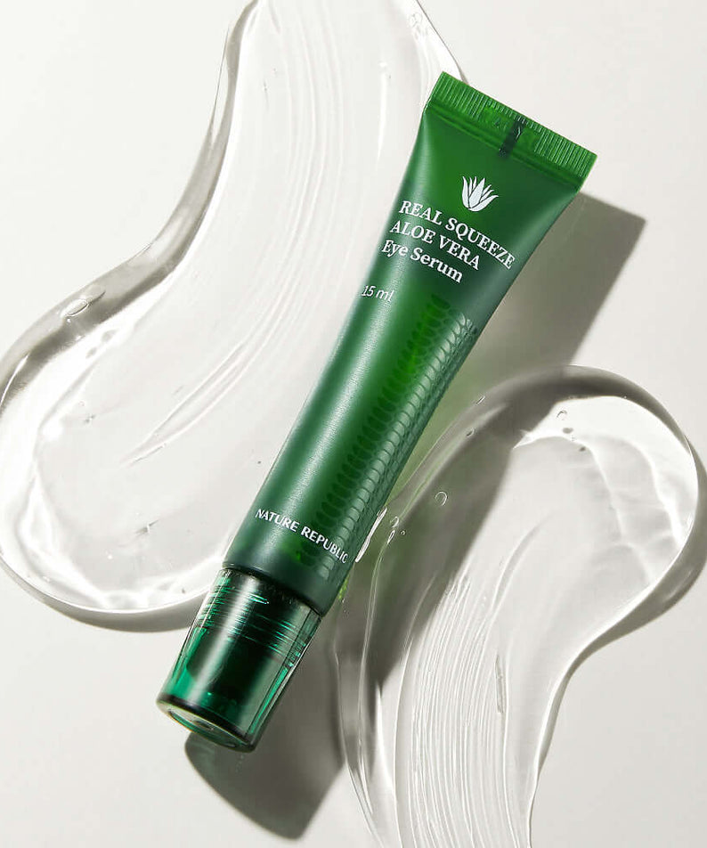 NATURE REPUBLIC Real Squeeze Aloe Vera Eye Serum 15ml tube on a textured background