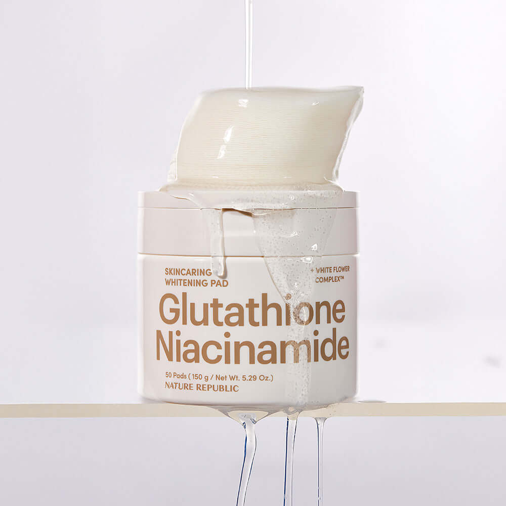 NATURE REPUBLIC Skincaring Whitening Pads 150g with Glutathione and Niacinamide featured in a white creamy texture.