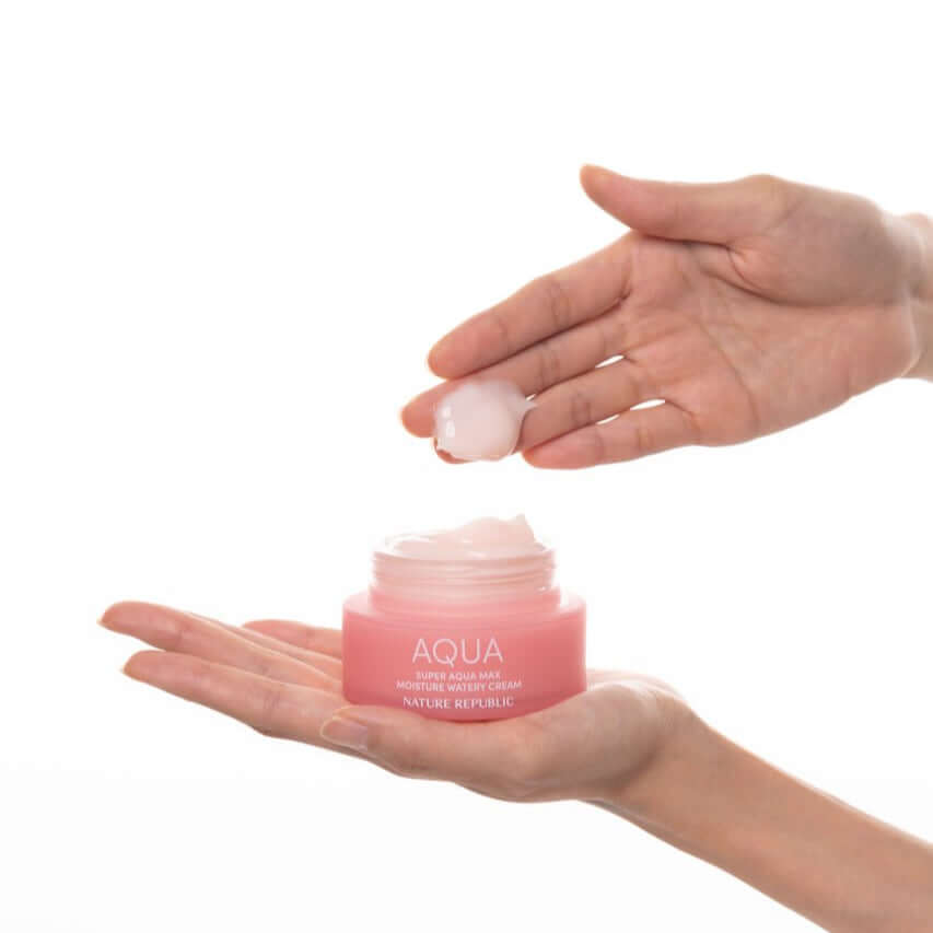 Applying NATURE REPUBLIC Super Aqua Max Moisture Watery Cream 80ml on hand