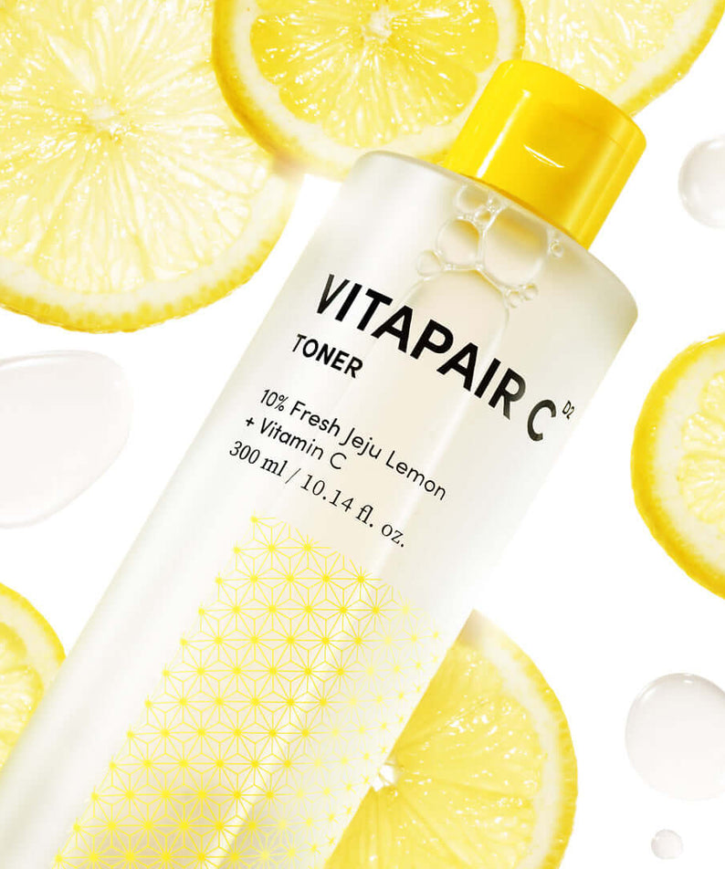 NATURE REPUBLIC VitaPair C Toner 300ml bottle with lemon slices, highlighting Vitamin C ingredients and fresh skincare benefits.