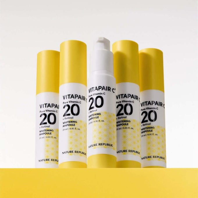 NATURE REPUBLIC Vitapair C Pure Vitamin C 20 Whitening Ampoule 24ml bottles displayed on a yellow background
