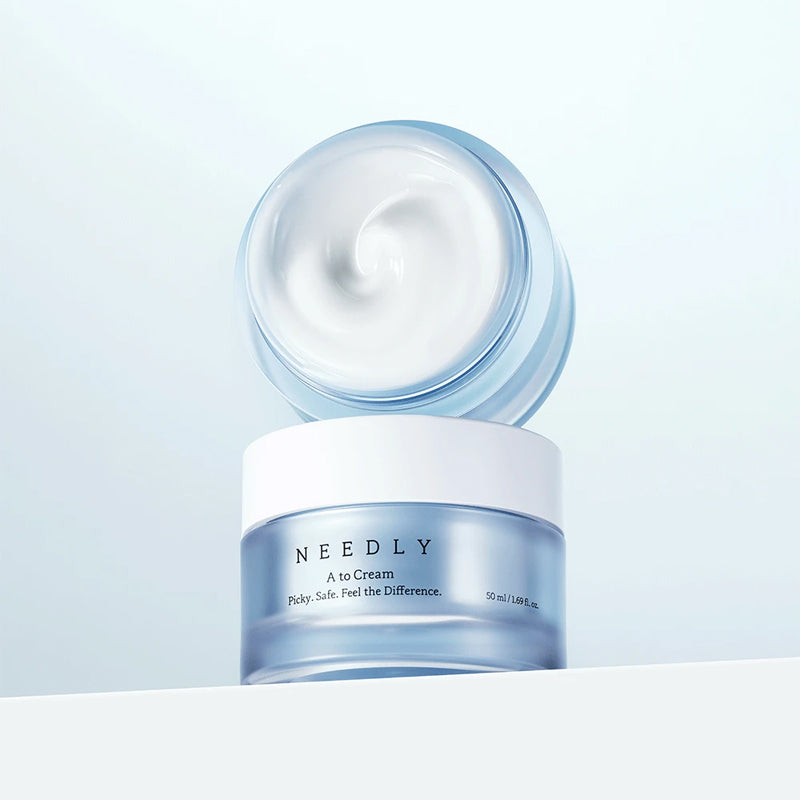 NEEDLY A to Cream 50ml jar showing creamy texture. Skincare product for effective moisturizing.