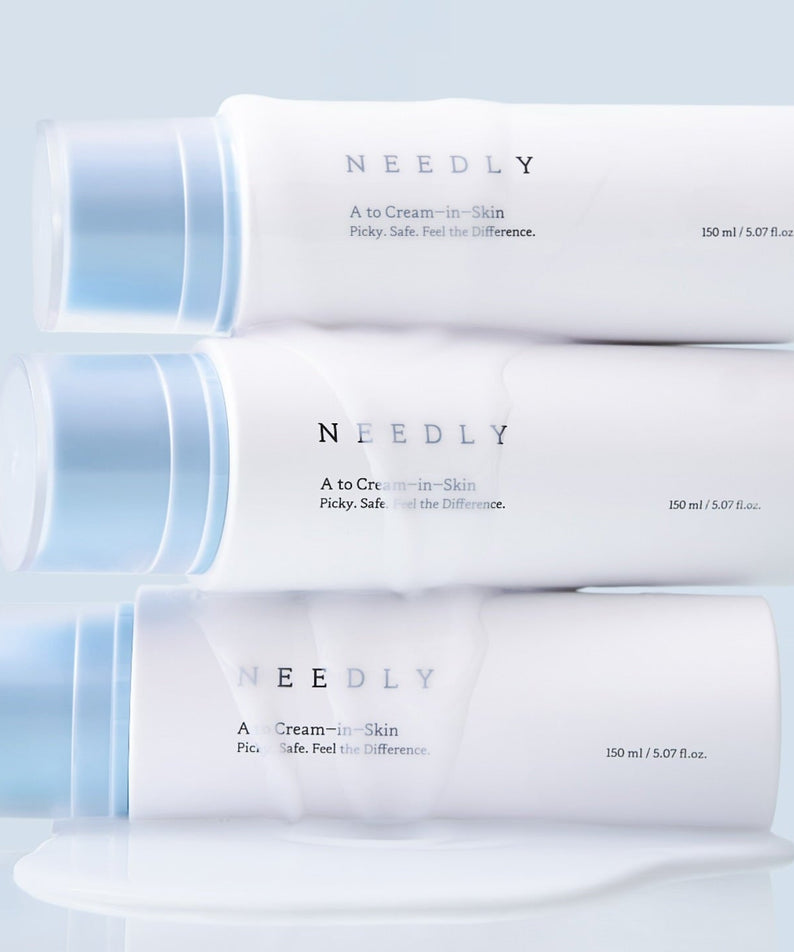 Three bottles of NEEDLY A to Cream Skin 150ml, a moisturizing skincare product.