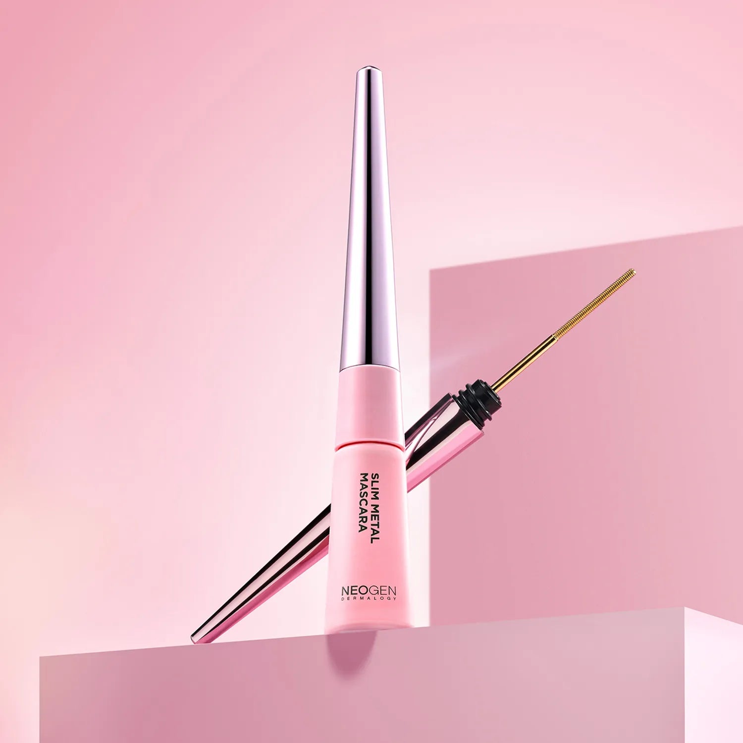 NEOGEN Slim Metal Mascara 6ml in elegant pink packaging with metallic accents on a modern display
