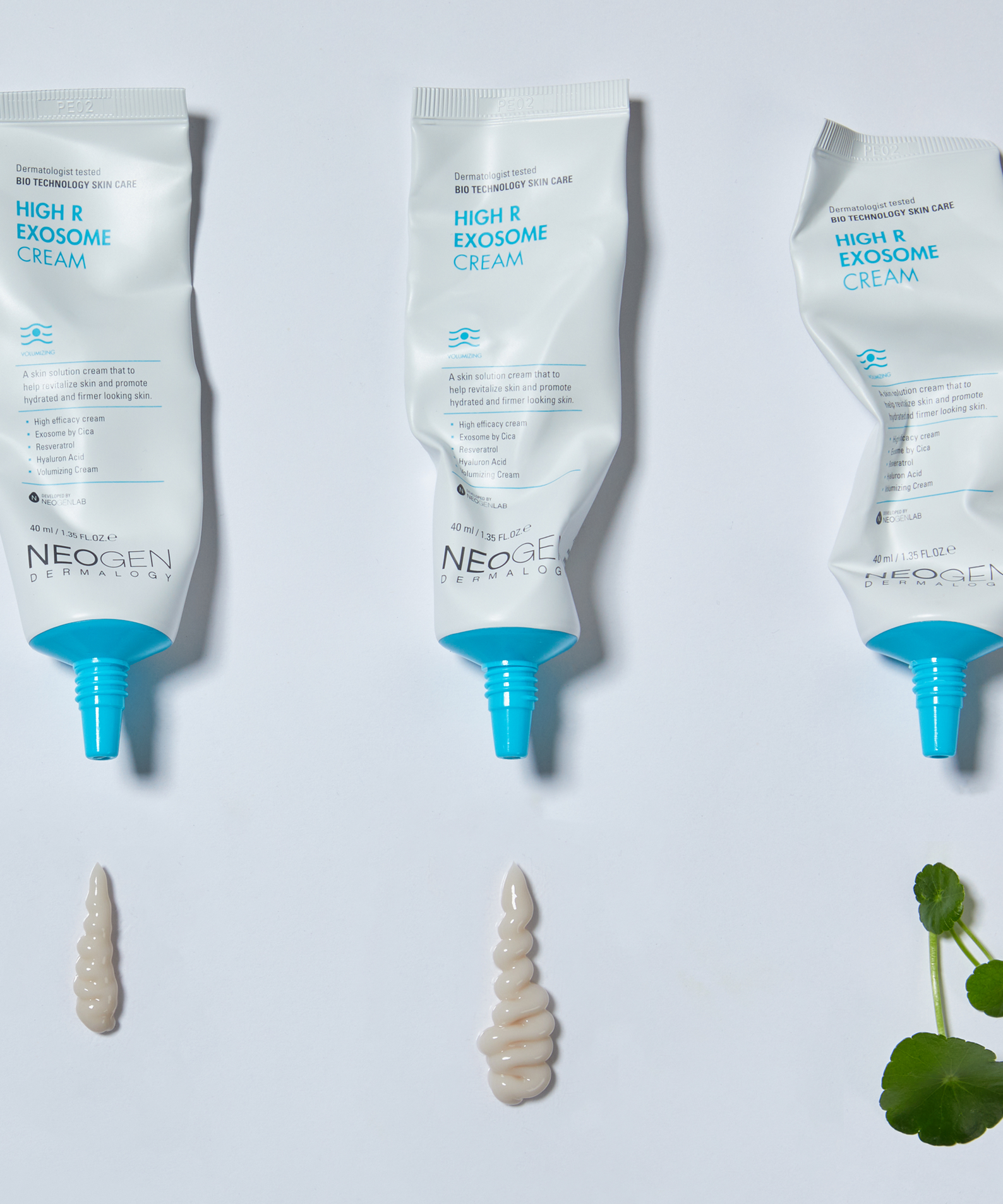 Three tubes of NEOGEN Hyal Exosome Cream 40ml dispensed on white surface, enhancing skin texture.