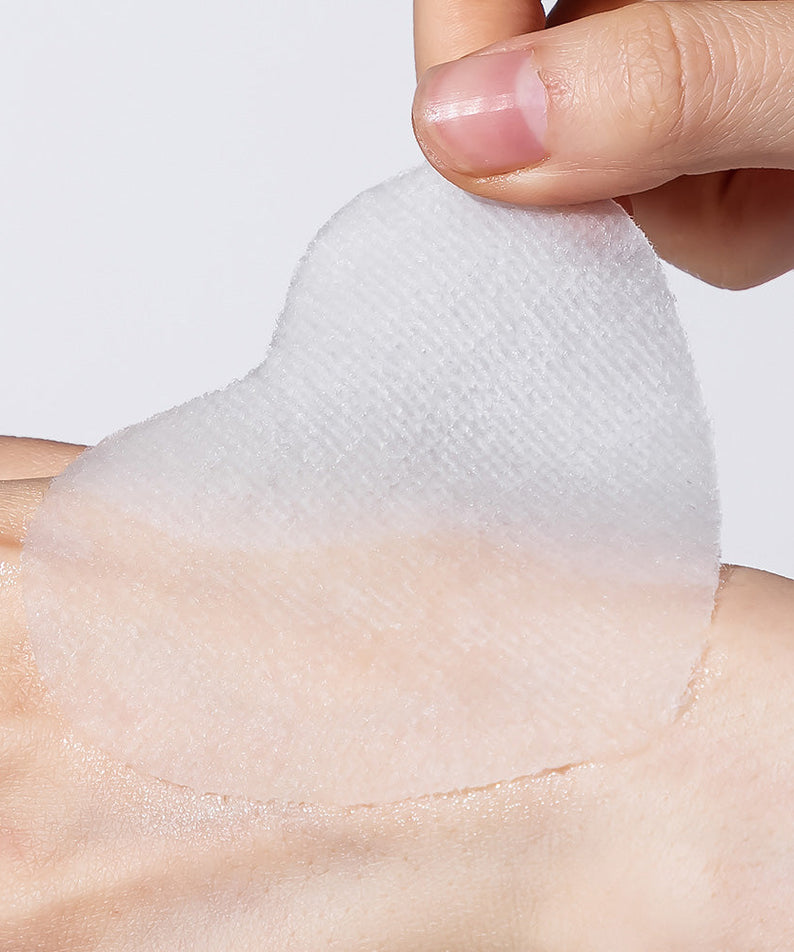 Applying NEOGEN Real Heartleaf Soothing Daily Mask 40 Sheets on skin for calming and hydration benefits.