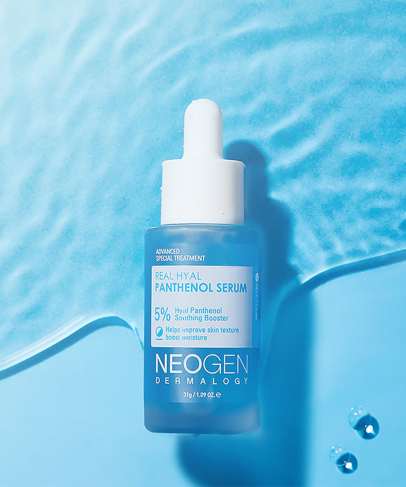 NEOGEN Real Hya Panthenol Serum 30ml bottle on blue background with water drops