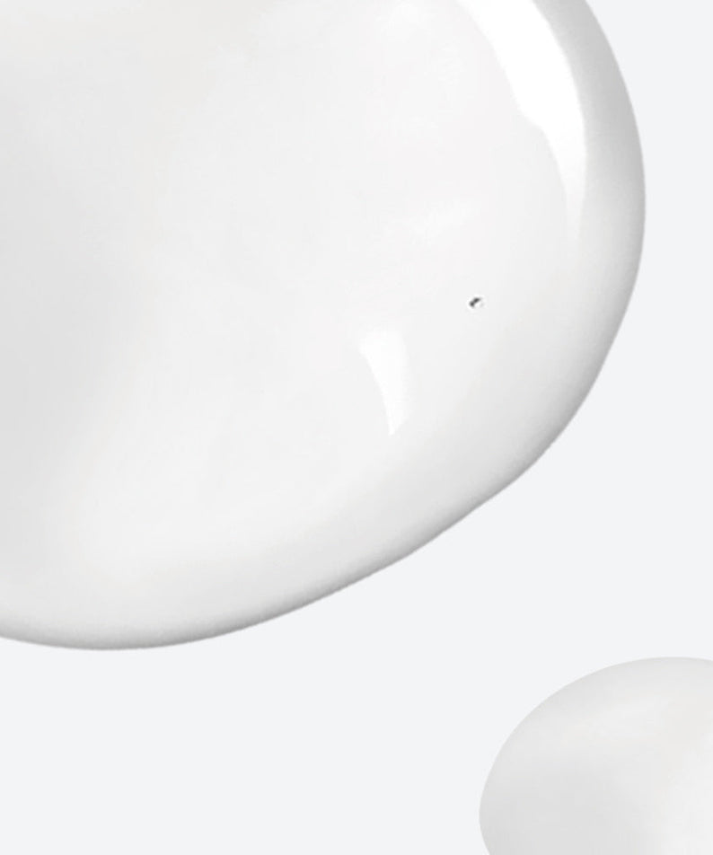 Texture of NEOGEN Real Niacinamide 15% Serum 30ml on a light background