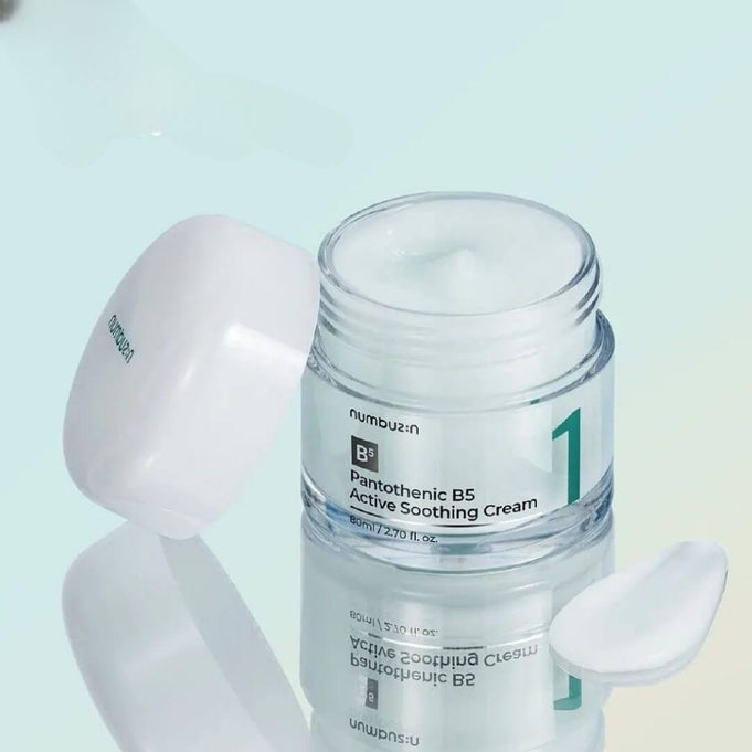 NUMBUZIN No.1 Pantothenic B5 Active Soothing Cream in a jar with a white lid and spatula on a light background