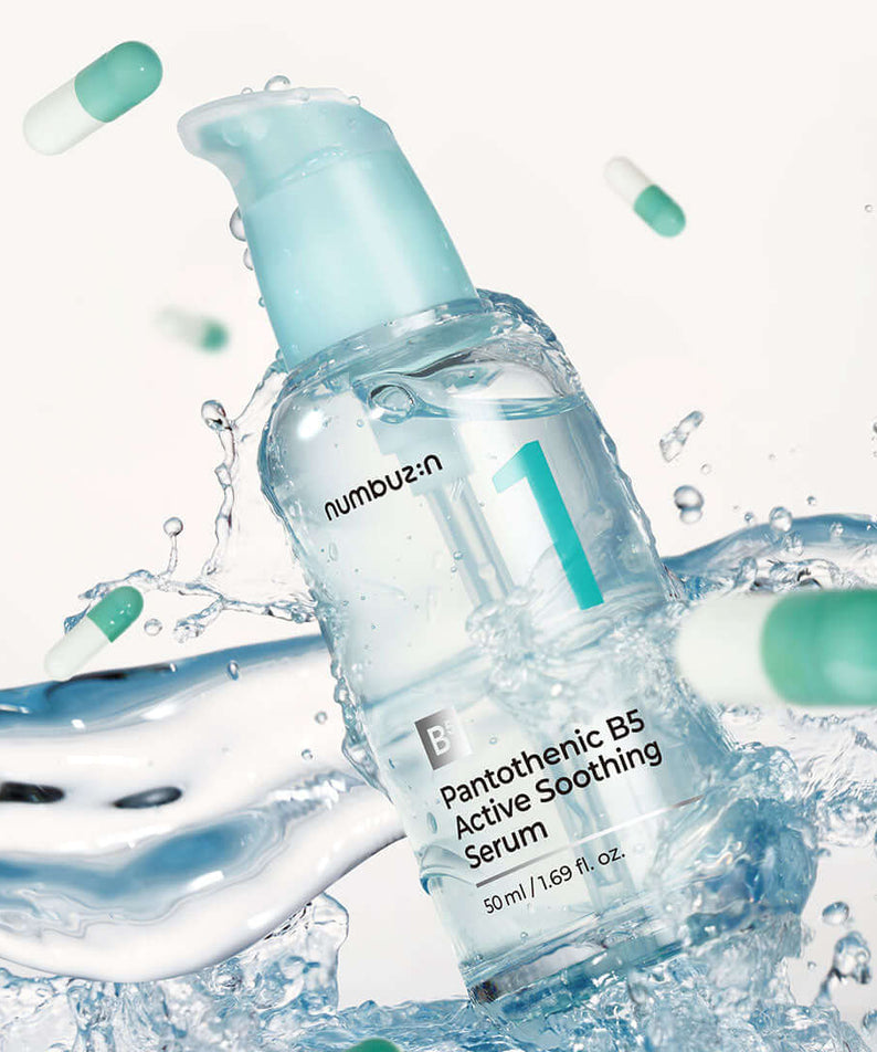 NUMBUZIN No.1 Pantothenic B5 Active Soothing Serum bottle with splashing water and capsules in the background.