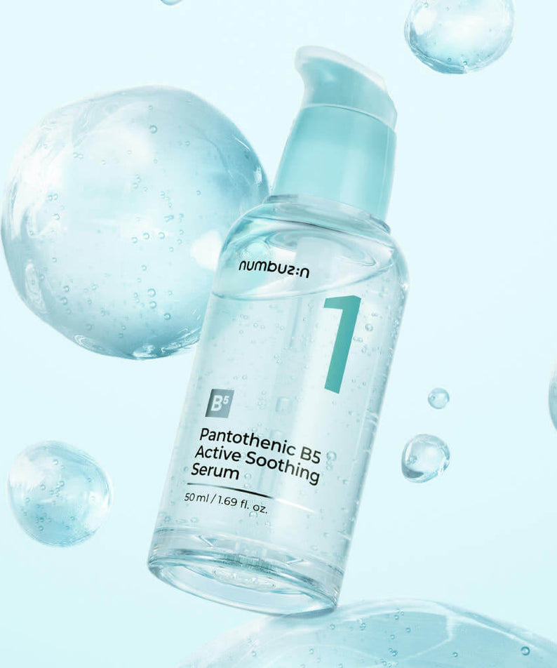 Bottle of NUMBUZIN No.1 Pantothenic B5 Active Soothing Serum with blue background and floating bubbles.