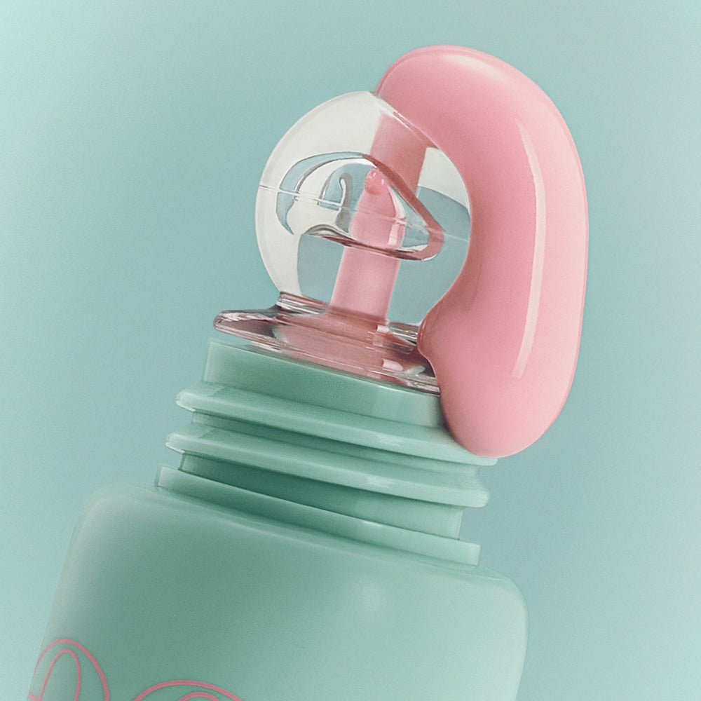 Close-up image of the NUSE Mousse Care Cheek Handy product top with pink mousse texture on mint green packaging.