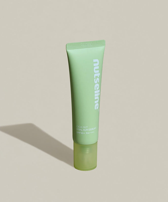 NUTSELINE Cica Nut Hyal Sun Serum 50ml skincare product tube on a neutral background