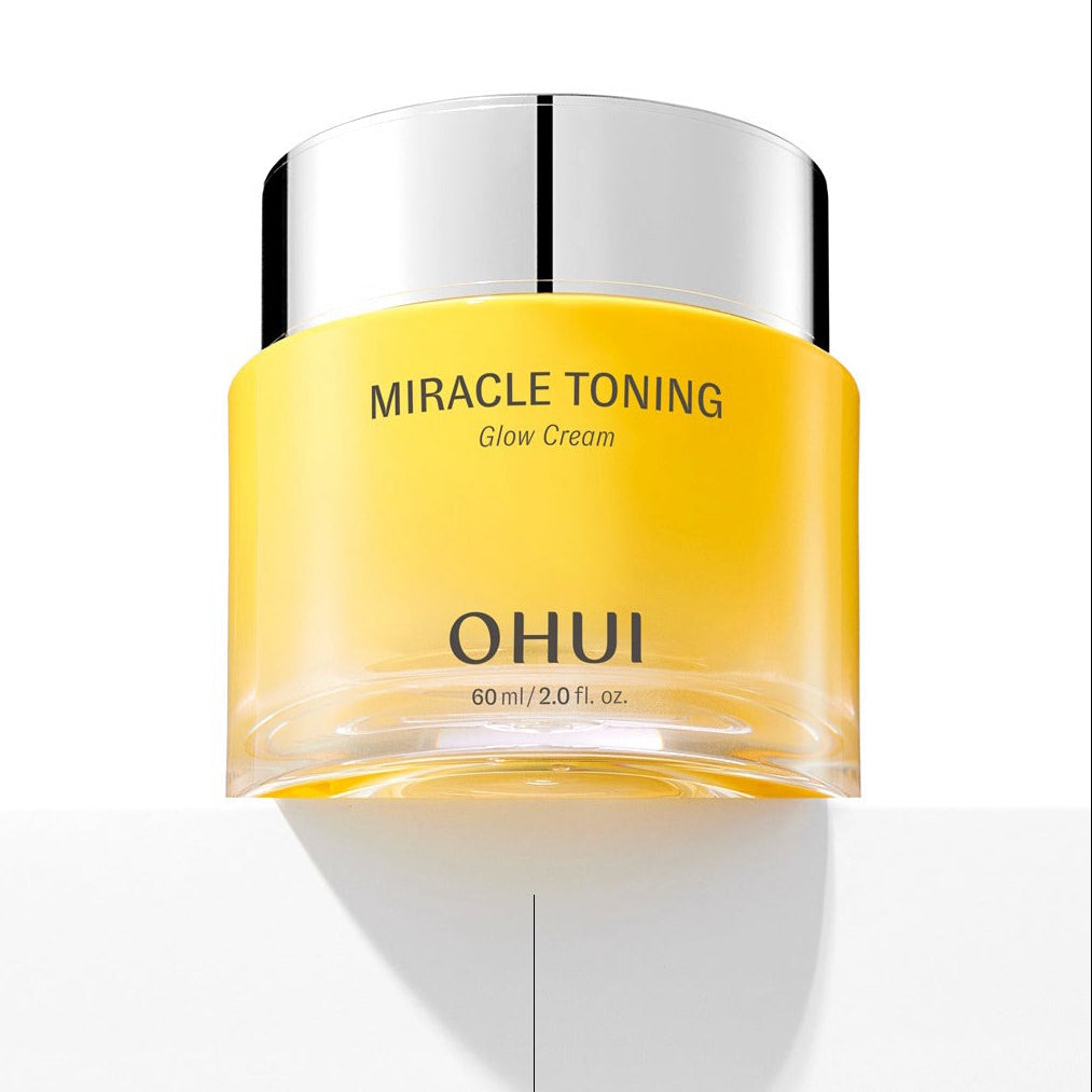 OHUI Miracle Toning Glow Cream 60 mL in a sleek yellow jar with shiny silver lid