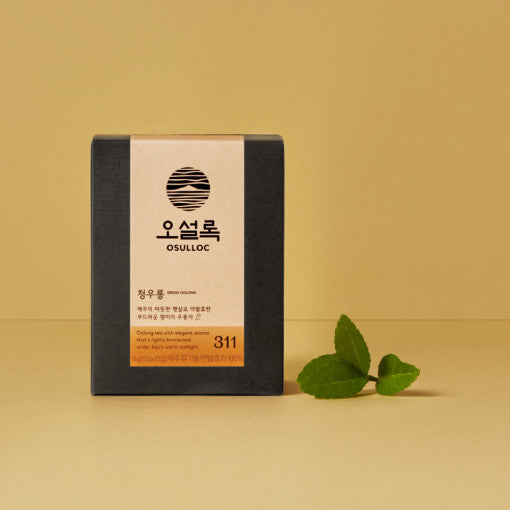 OSULLOC Green Oolong Tea 10p package with tea leaves on beige background