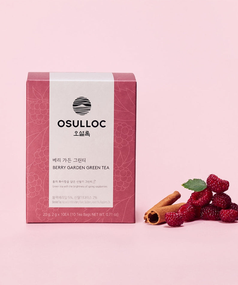 OSULLOC Berry Garden Green Tea 10 P with raspberries and cinnamon on a pink background.