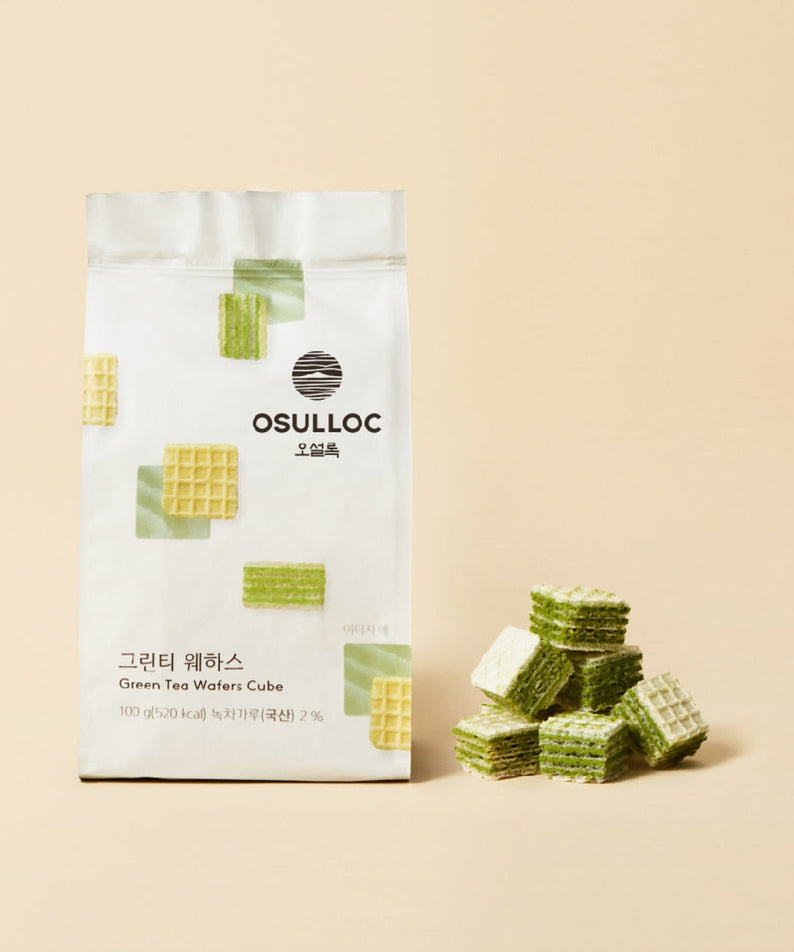 OSULLOC Green Tea Wafers 100g pack with green and cream-colored wafers next to bag on beige background
