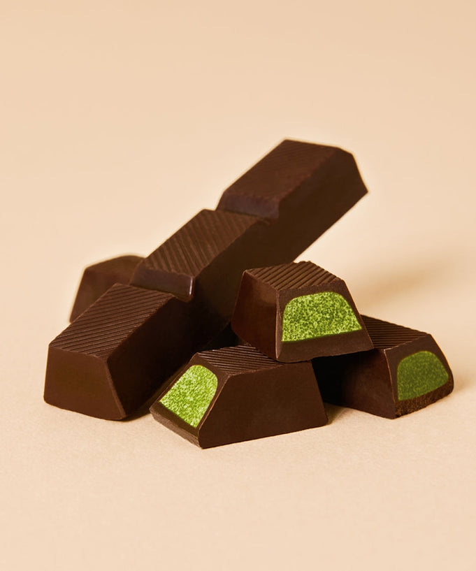 OSULLOC Jeju Island Green Tea Chocolate Bar 120g pieces with green tea filling on display