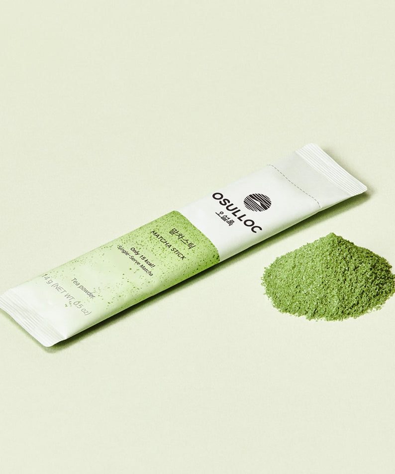 "OSULLOC Matcha Sticks 5 p. single stick on a light background with green matcha powder"
