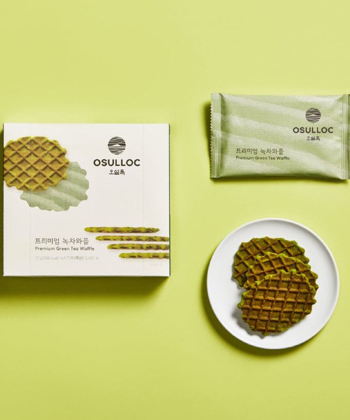 OSULLOC Premium Green Tea Waffle 72g packaging and product display on a plate on green background