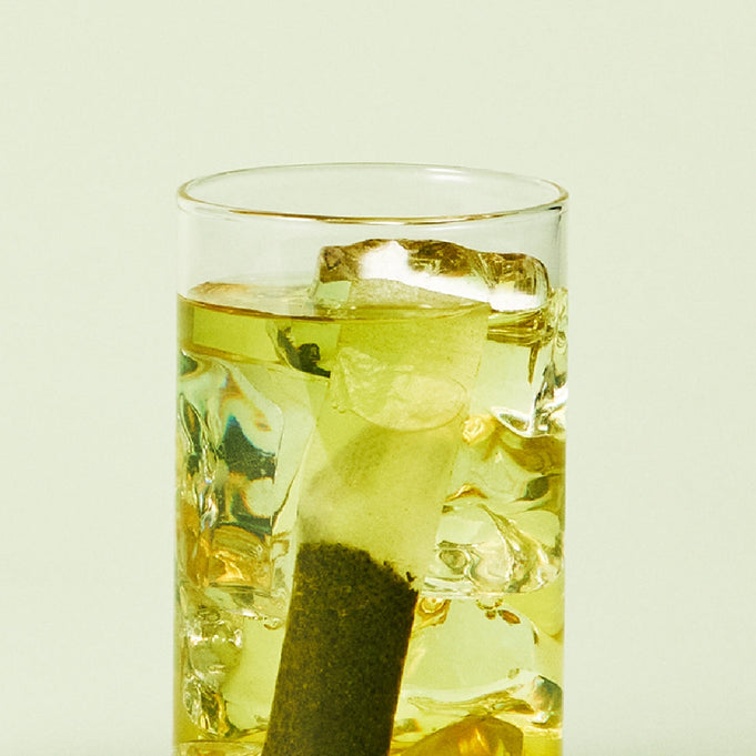 Glass of OSULLOC Sunshine Muscat Cold Brew Tea 20 p with ice cubes