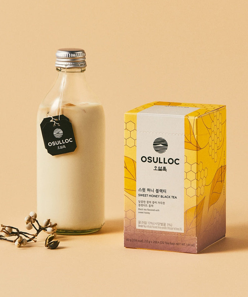 OSULLOC Sweet Honey Black Tea 20 P package beside milk bottle on table