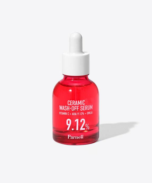 PARNELL AHA 9.12 Caremic Wash-Off Serum 30ml in a red bottle with dropper cap, featuring vitamin C and omega benefits.