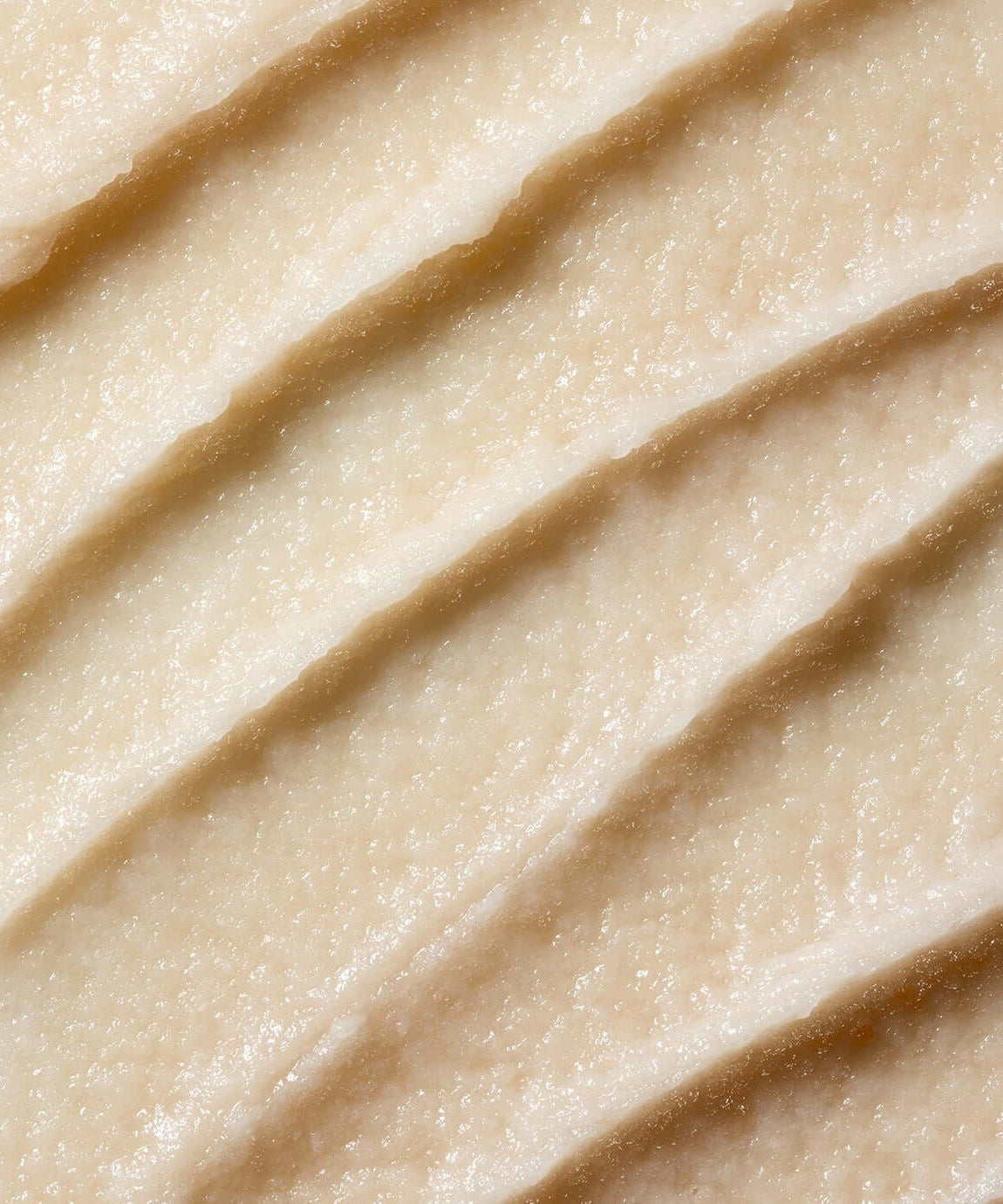 Close-up texture of PARNELL AHA Omija Ceramic Bubble Peeling Cleanser 180ml skincare product.