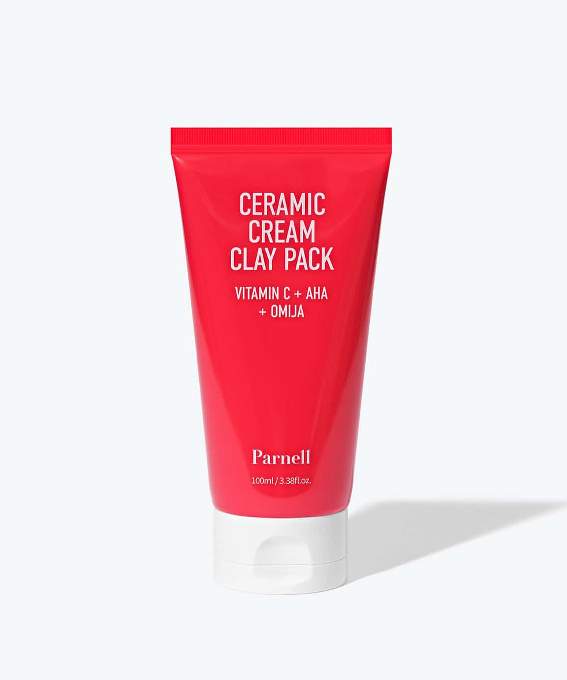 PARNELL AHA Omija Ceramic Cream Clay Pack 100ml tube with red packaging, featuring Vitamin C, AHA, and Omija ingredients.