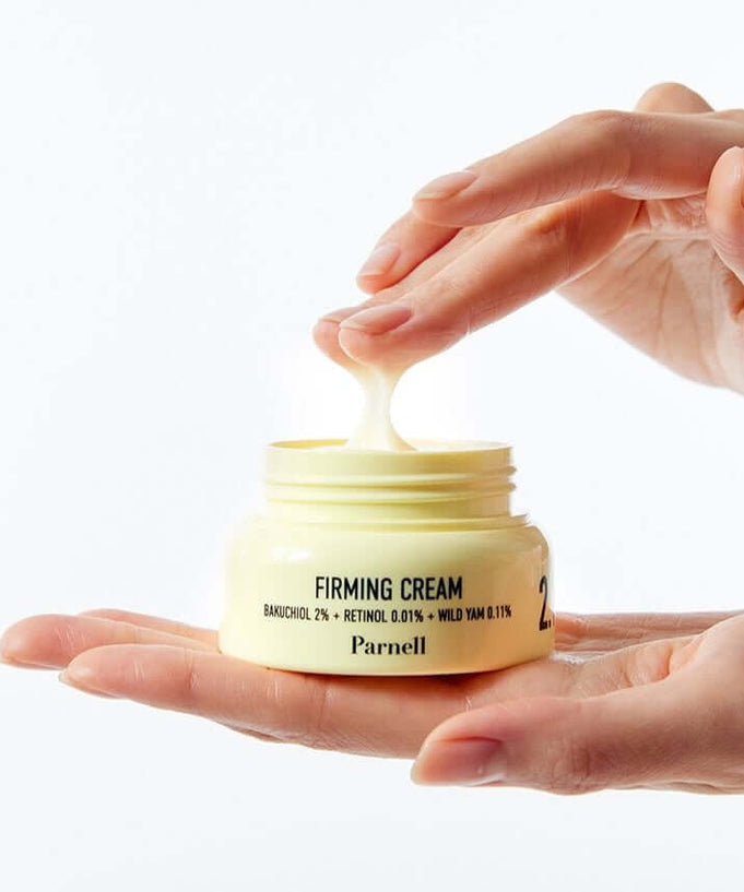 PARNELL Bakuchiol Retinol Wild Yam Firming Cream 50ml being applied from jar.