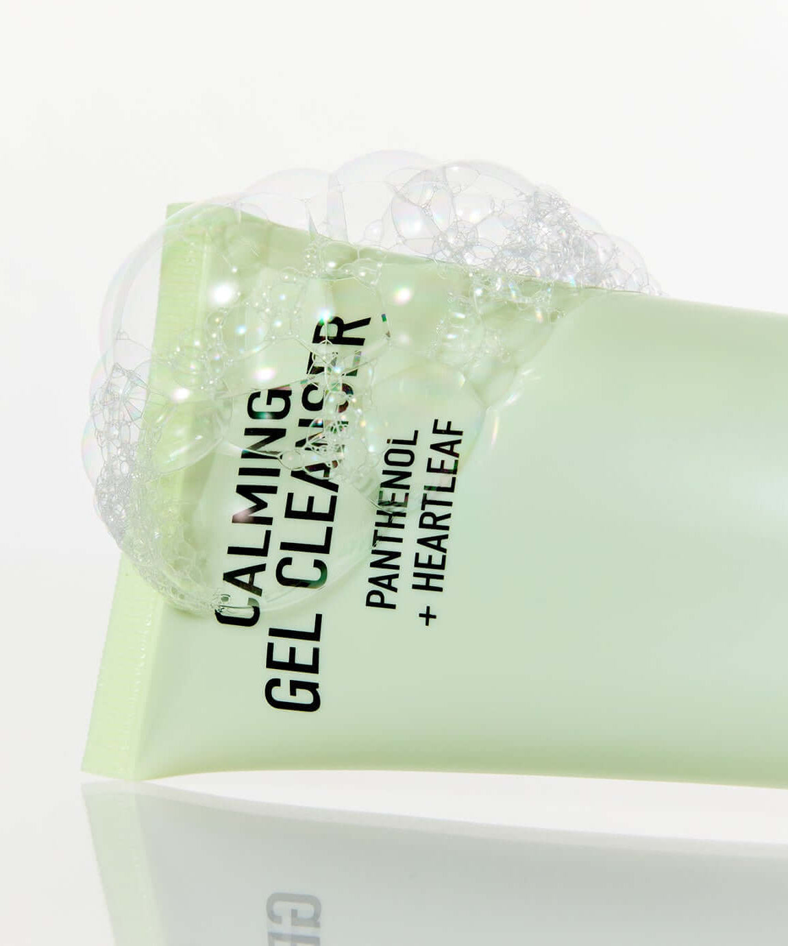 PARNELL Panthenol Heartleaf Calming Gel Cleanser 180ml with foam bubbles on tube.