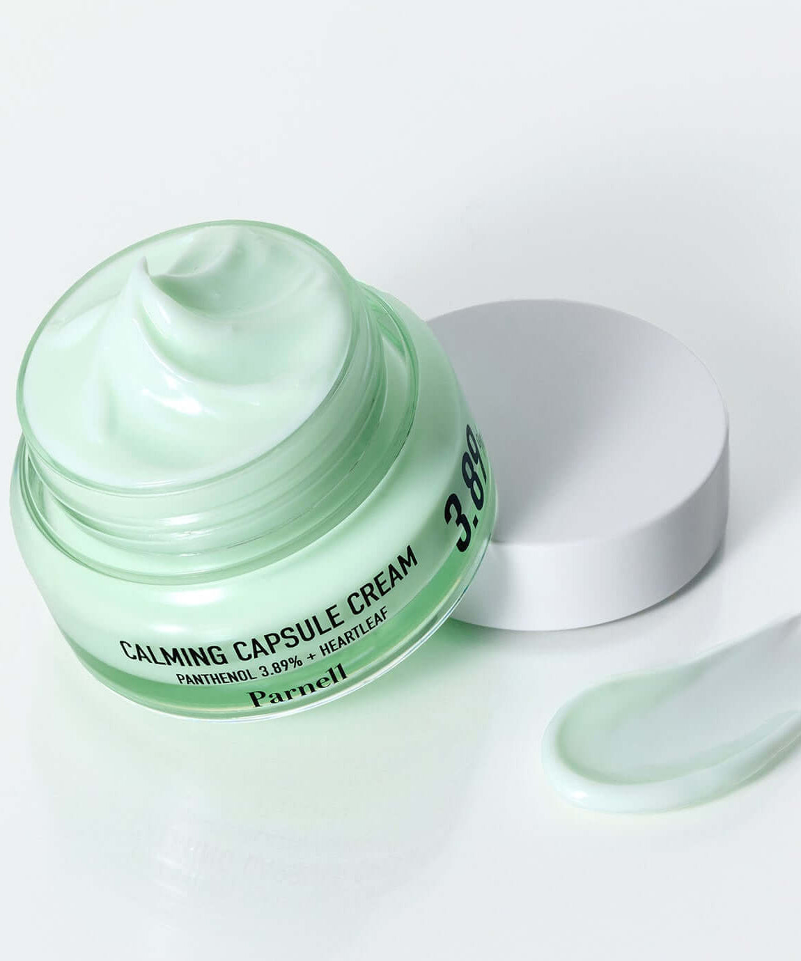 PARNELL Pathenol 3.89 Heartleaf Calming Cream 50ml jar with open lid showing texture and a dollop on the side.