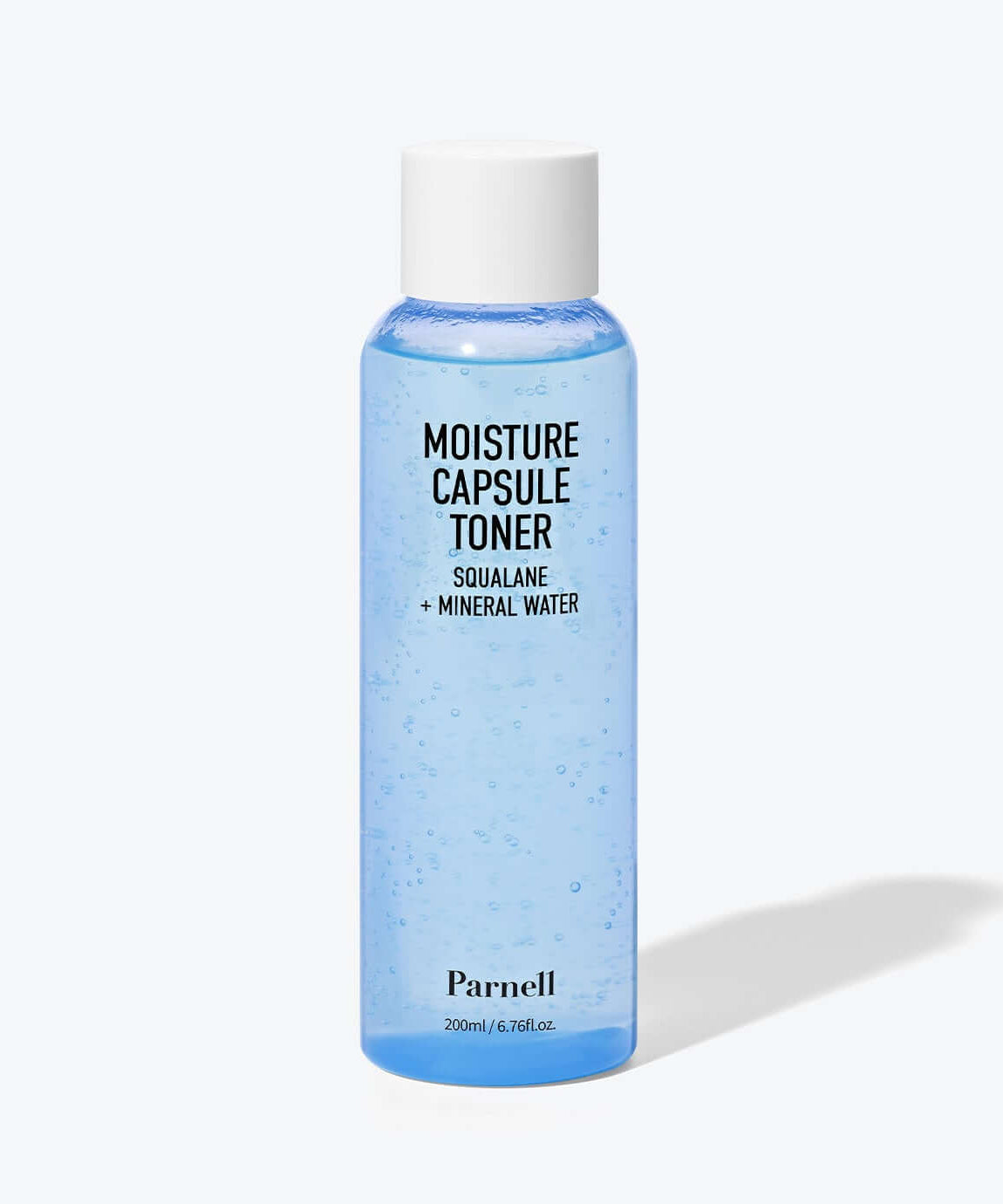 Bottle of PARNELL Squalane Mineral Water Moisture Capsule Toner 200ml showing blue liquid with white cap on a neutral background.