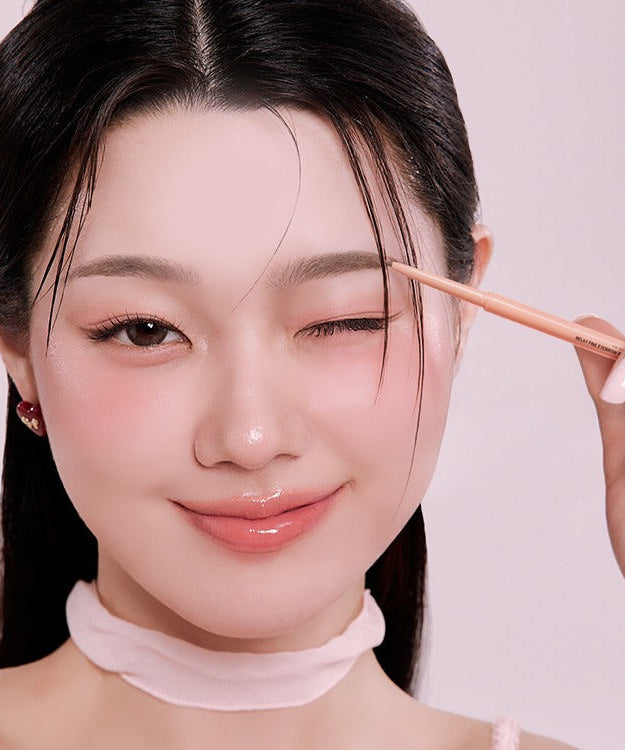 Woman using PASSION CAT Relay Fine Eyebrown Pencil 0.09g to enhance brows