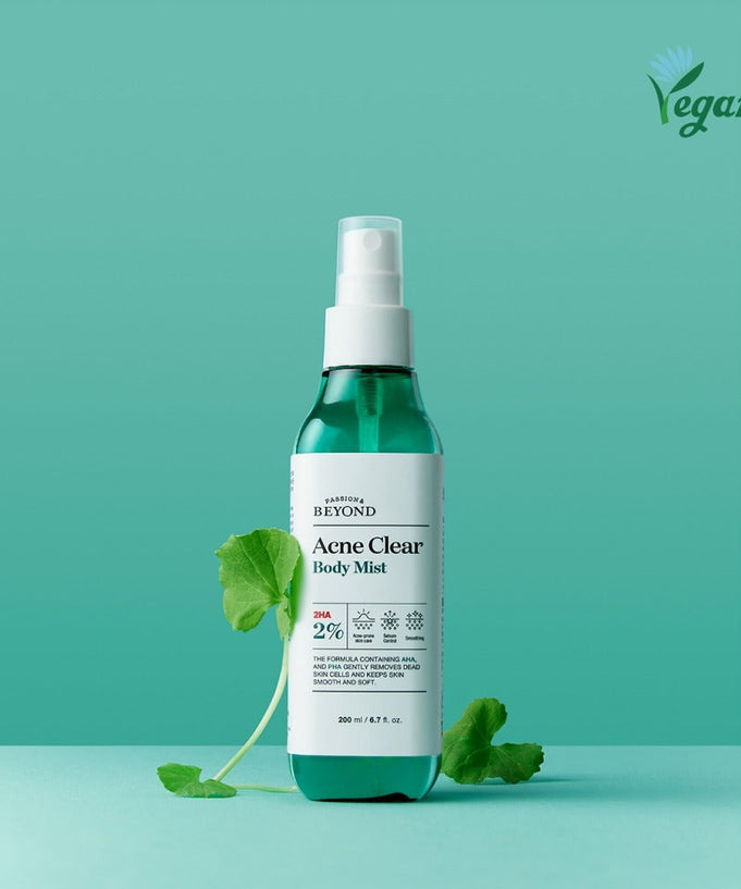 PASSON&BEYOND Acne Clear Body Mist 200ml bottle on a teal background, showcasing its vegan formula with natural leaves.