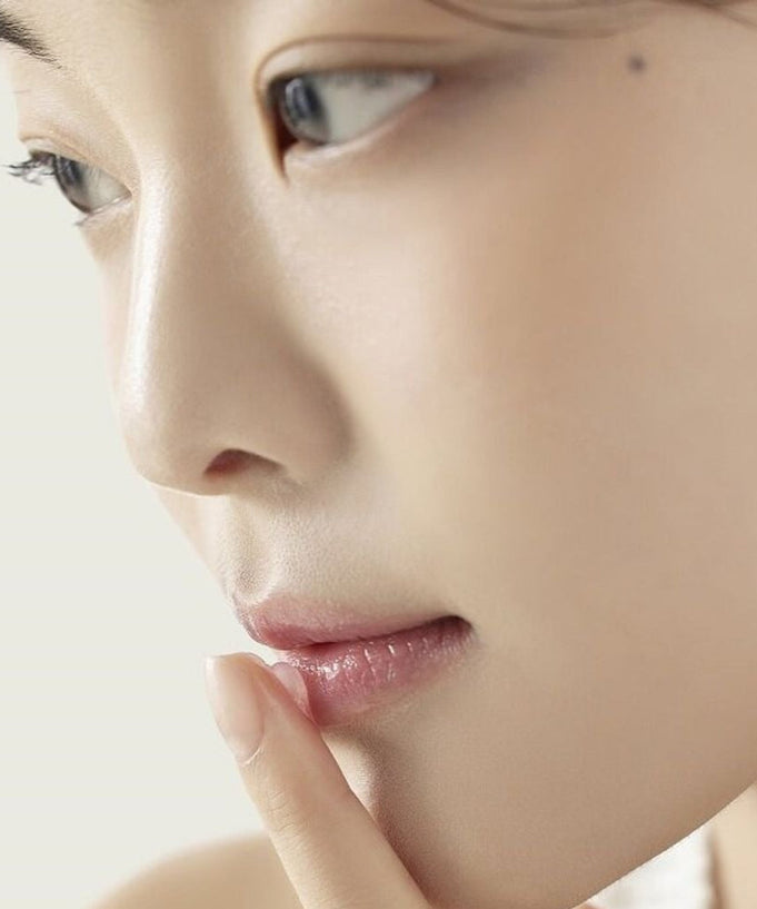 Close-up of a person showcasing smooth lips, ideal for PASSION&BEYOND Angel Aqua Moisture Plumping Lipcarin 15ml product.